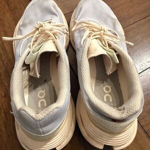 On Running Light Blue and White Athletic Shoes